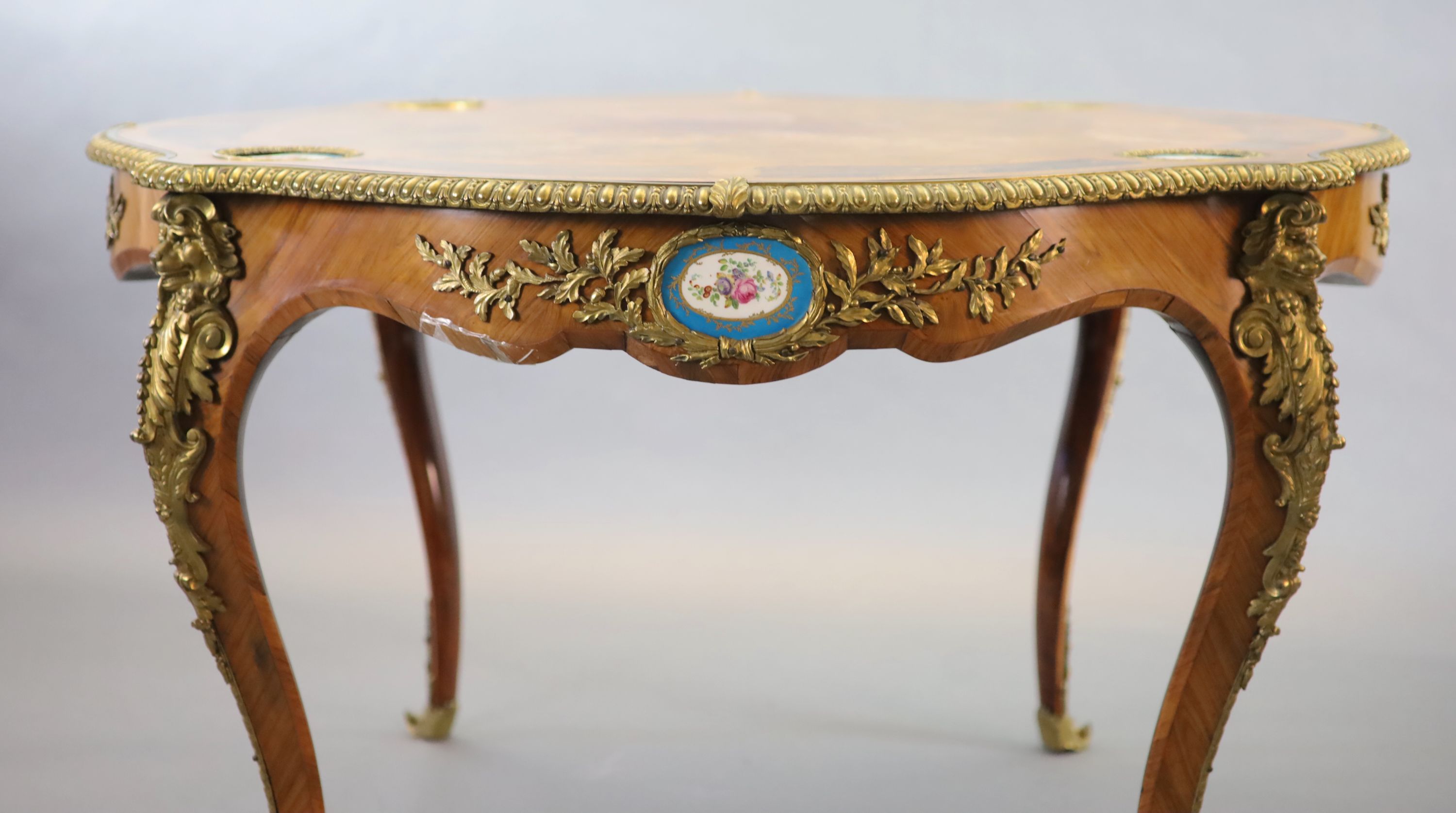 A Victorian Louis XV style ormolu mounted walnut centre table, W.122cm H.76cm